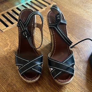 Christian Louboutain wedge shoe black.